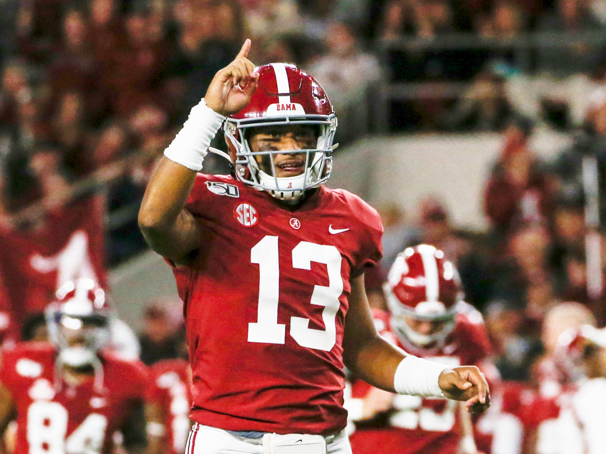 Oct 19, 2019; Tuscaloosa, AL, USA; Alabama Crimson Tide quarterback Tua Tagovailoa (13) celebrates after a touchdown during the first half of an NCAA football game against the Tennessee Volunteers at Bryant-Denny Stadium. Mandatory Credit: Butch Dill-USA TODAY Sports
